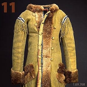 William F. 'Buffalo Bill' Cody's intricately detailed hide coat from circa 1870, adorned with fur trim and fringe, reflecting his iconic frontier style.