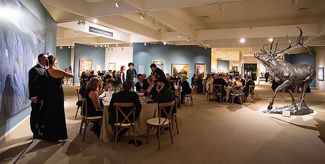 Dining in the Whitney Western Art Museum at Patrons Ball in 2024.