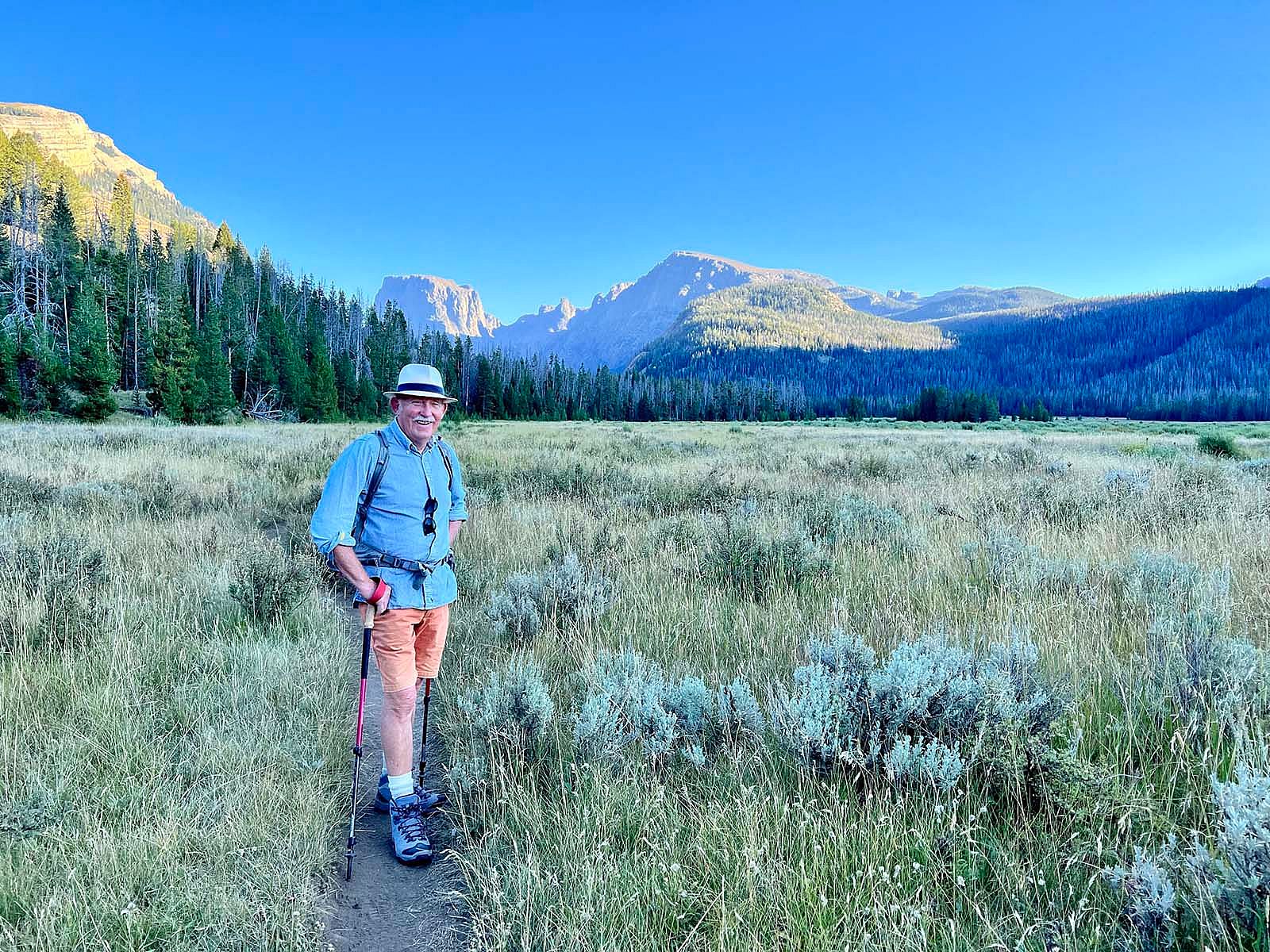 Artist Tony Foster on the trail in the Wind River Mountains with Squaretop in the background, September 2022. Photograph courtesy of Karen Brooks McWhorter.