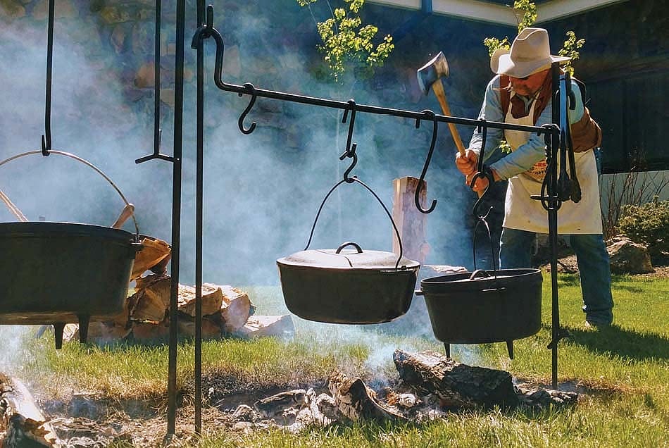 Rich, chopping wood for chuckwagon cooking