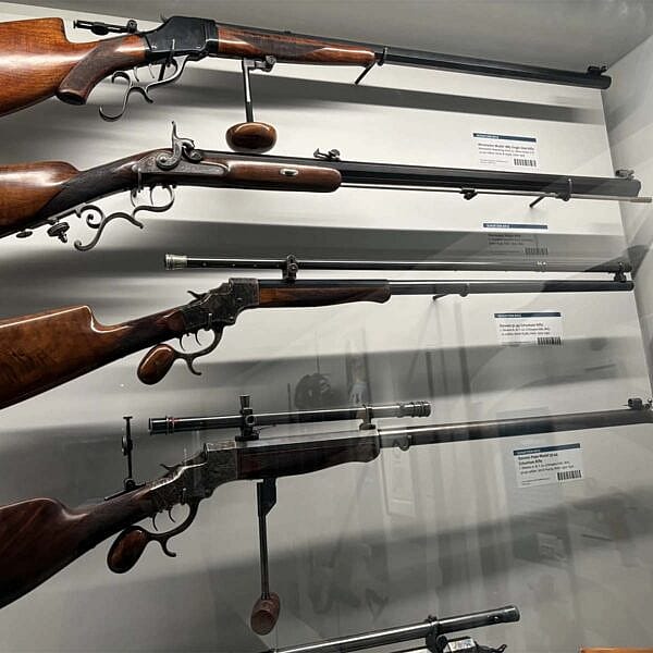 Schuetzenfest rifles are on display in the shooting sports section of the Cody Firearms Museum.